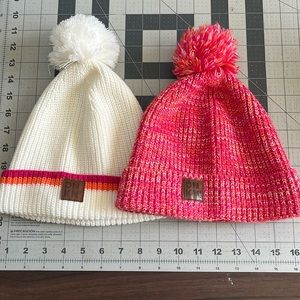 Two (sold as a pair) Dunkin’ Donuts knit beanies!